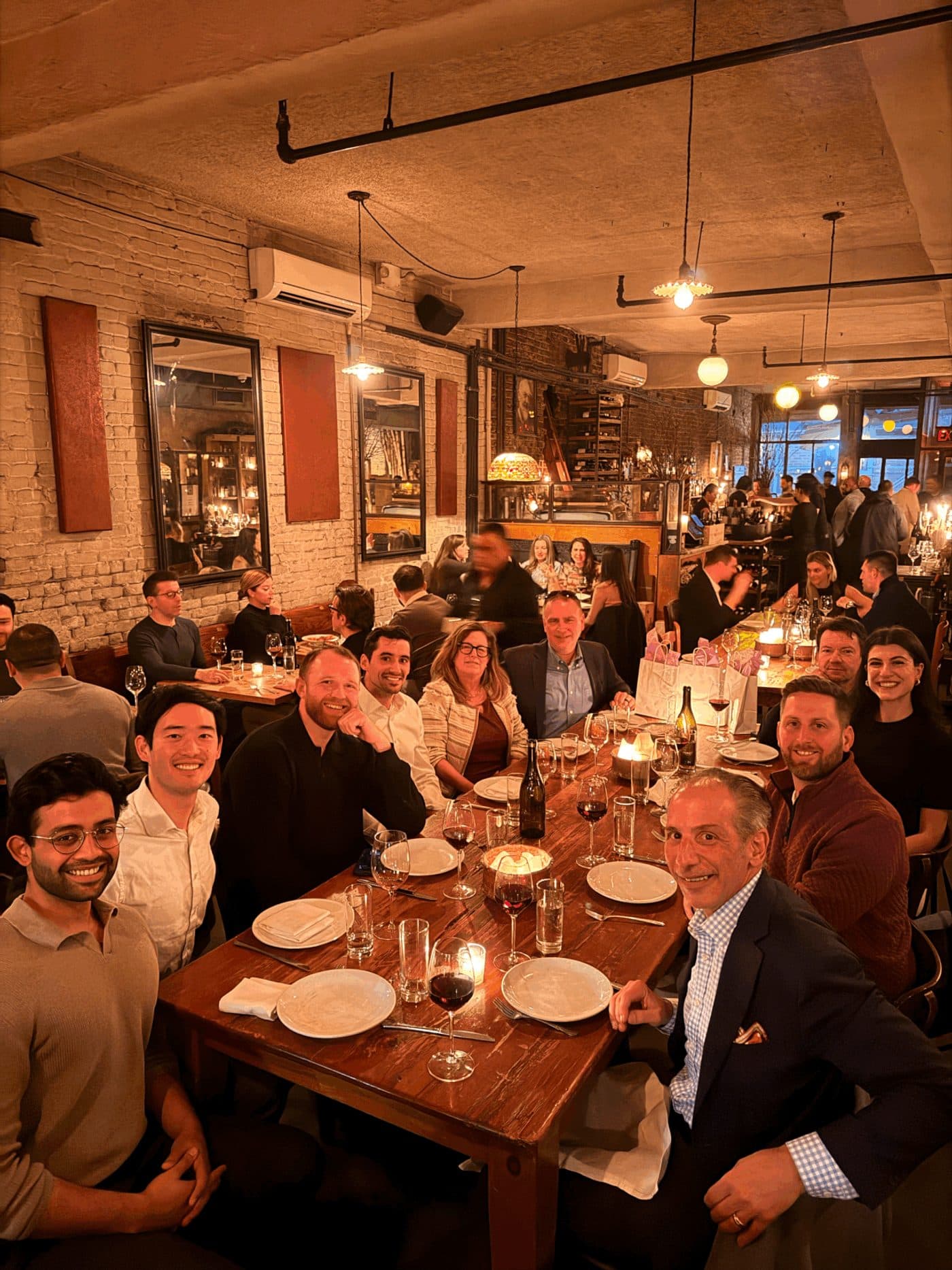 The Frontdesk team at a dinner in a New York City restaurant